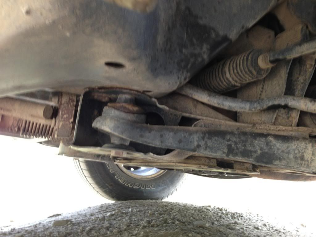Front suspension loud creak over speed bumps Ford Escape